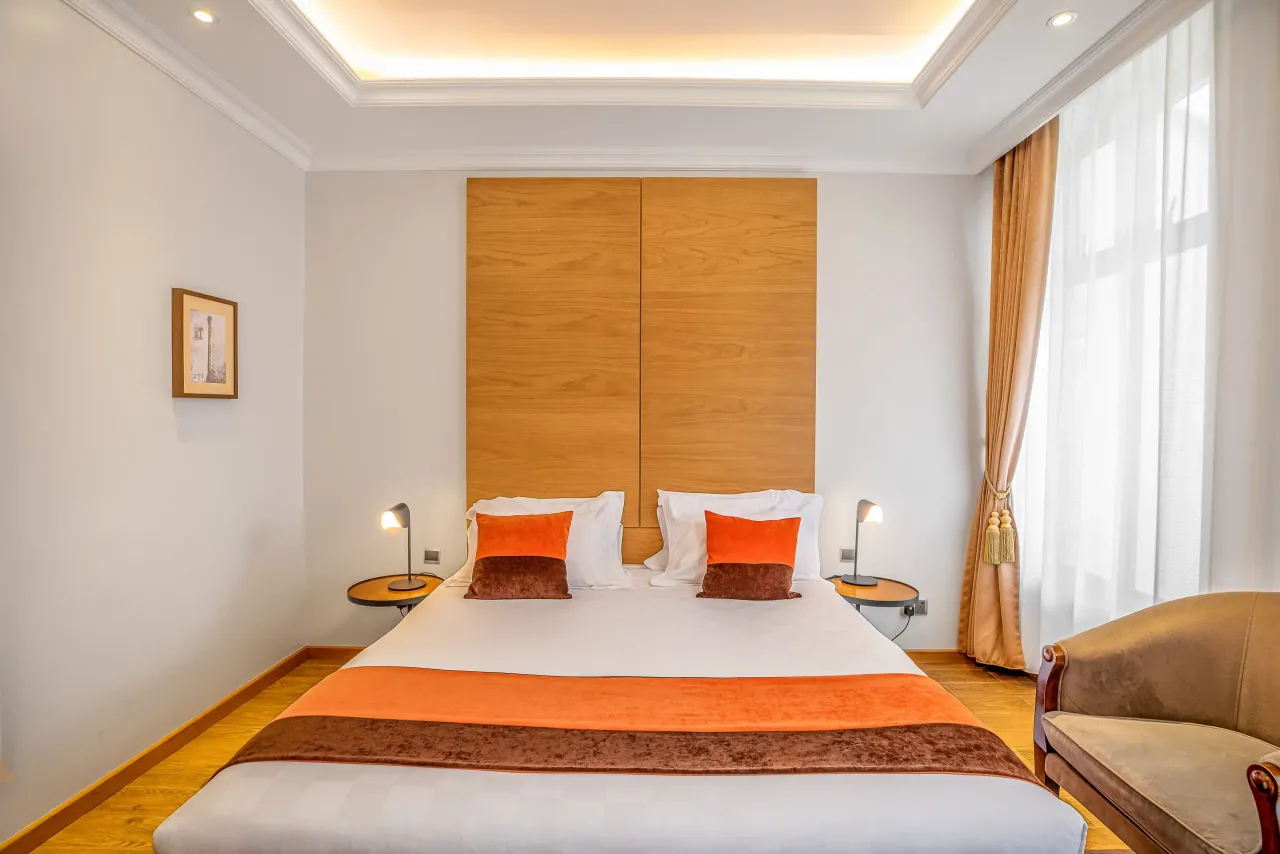 Executive Deluxe Room - comfortable bed with modern decor